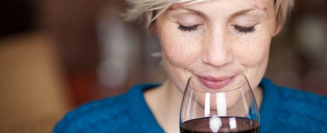 Female Customer Drinking Red Wine