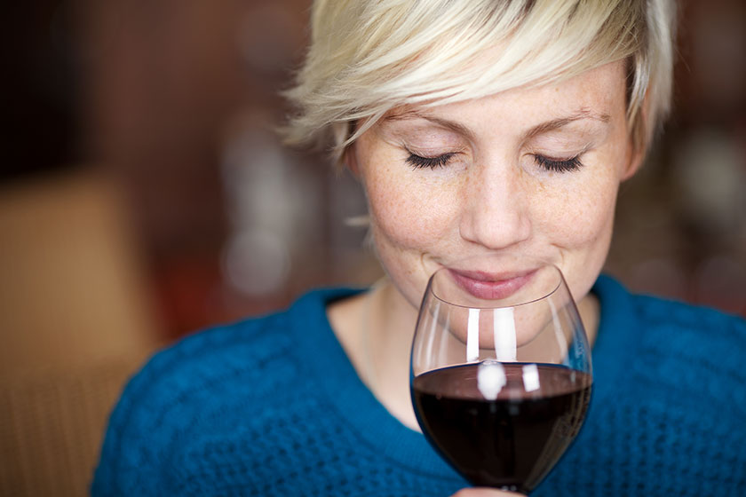 Female Customer Drinking Red Wine