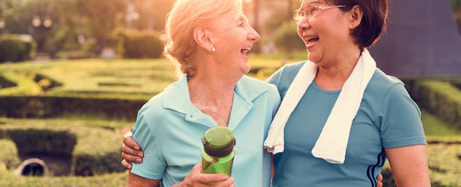 Senior women embracing after fitness